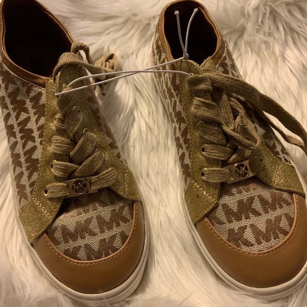 Authentic Michael “MK” Kors designer sneakers.